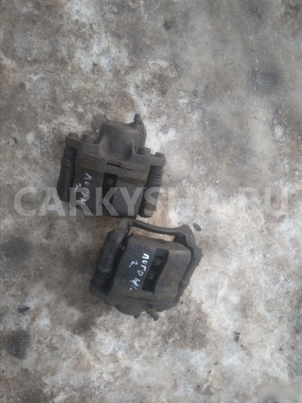 Суппорт тормозной передний Renault Logan I (2004—2009) Renault 20 