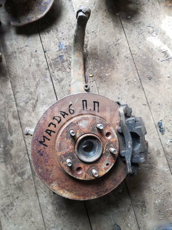 Кулак поворотный передний Mazda 6 GG (2002—2005) Mazda 2 