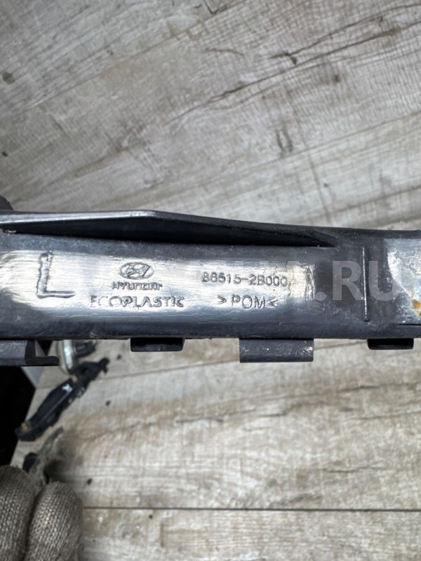 Кронштейн перед бампера левый Hyundai Santa Fe II Hyundai Sonata оригинальный номер 865152b000