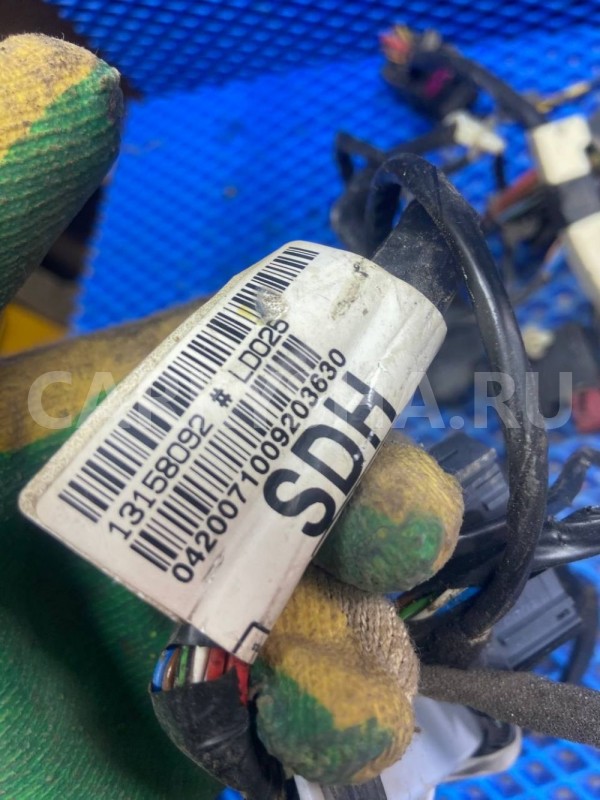 Проводка двери Opel Astra GTC H (2004—2007) Opel Astra оригинальный номер 13158092