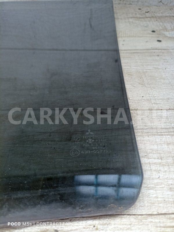 Стекло двери Mitsubishi Lancer IX (2000—2007) Mitsubishi i оригинальный номер MR556411