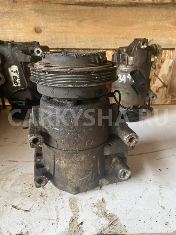 Компрессор кондиционера Hyundai Elantra III (2000—2003) Hyundai Elantra оригинальный номер 977012D500