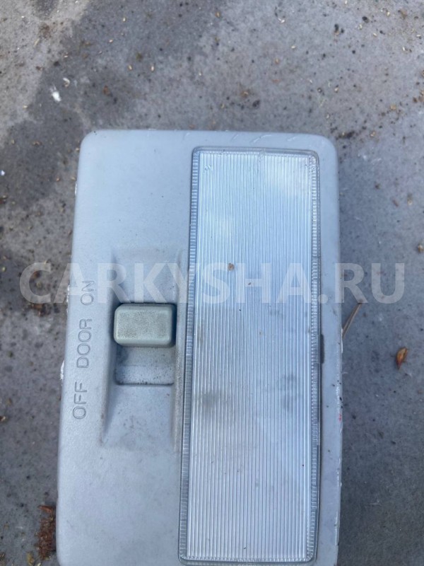 Плафон салонный Mazda Demio IDY (2002—2007) Mazda 2 оригинальный номер 997005100L